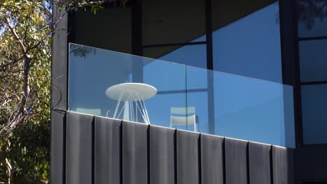 Shot-of-balcony-on-luxury-house-set-amongst-gumtrees