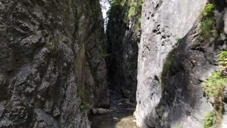 Young-Man-Walking-Canyon-River-Aerial-Drone