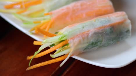 making fresh vietnamese spring rolls on a plate