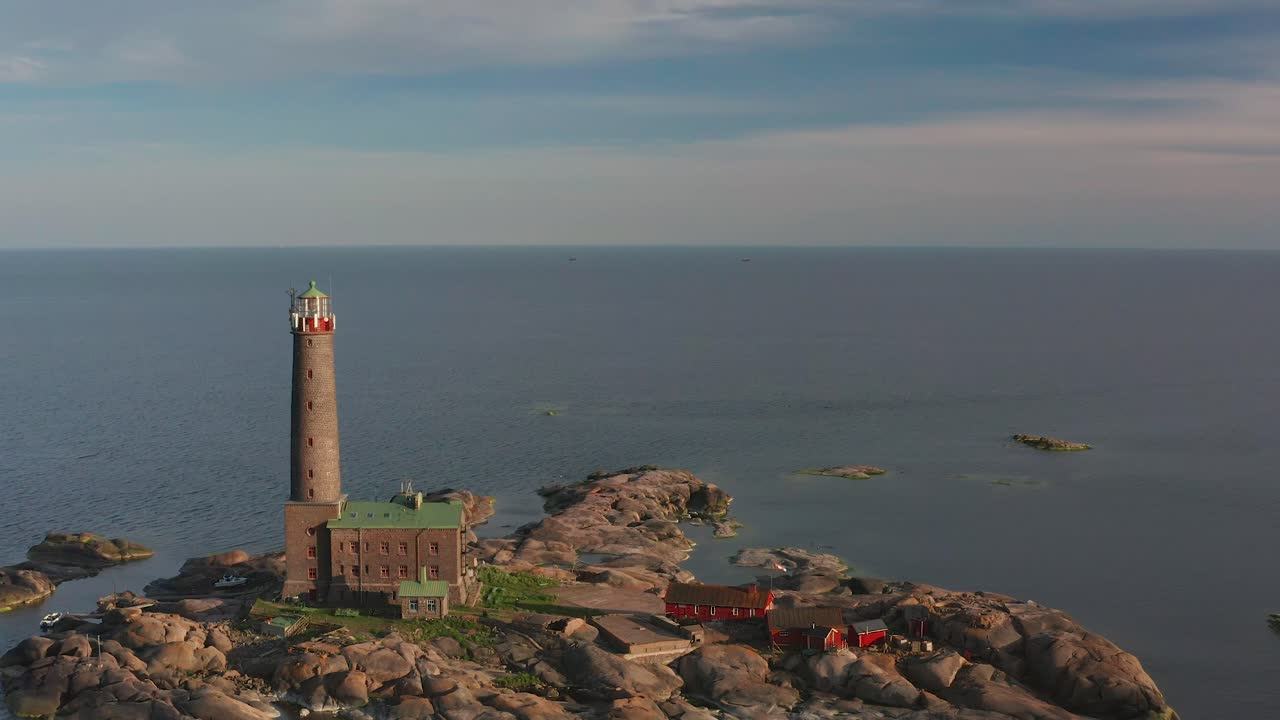 Aerial view of Bengtskär lighthouse during setting sun. The lighthouse is the tallest lighthouse in the Nordic countries and is famous for the beautiful surroundings.