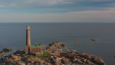 aerial view of bengtskär lighthouse during setting sun. the lighthouse is the tallest lighthouse in the nordic countries and is famous for the beautiful surroundings.