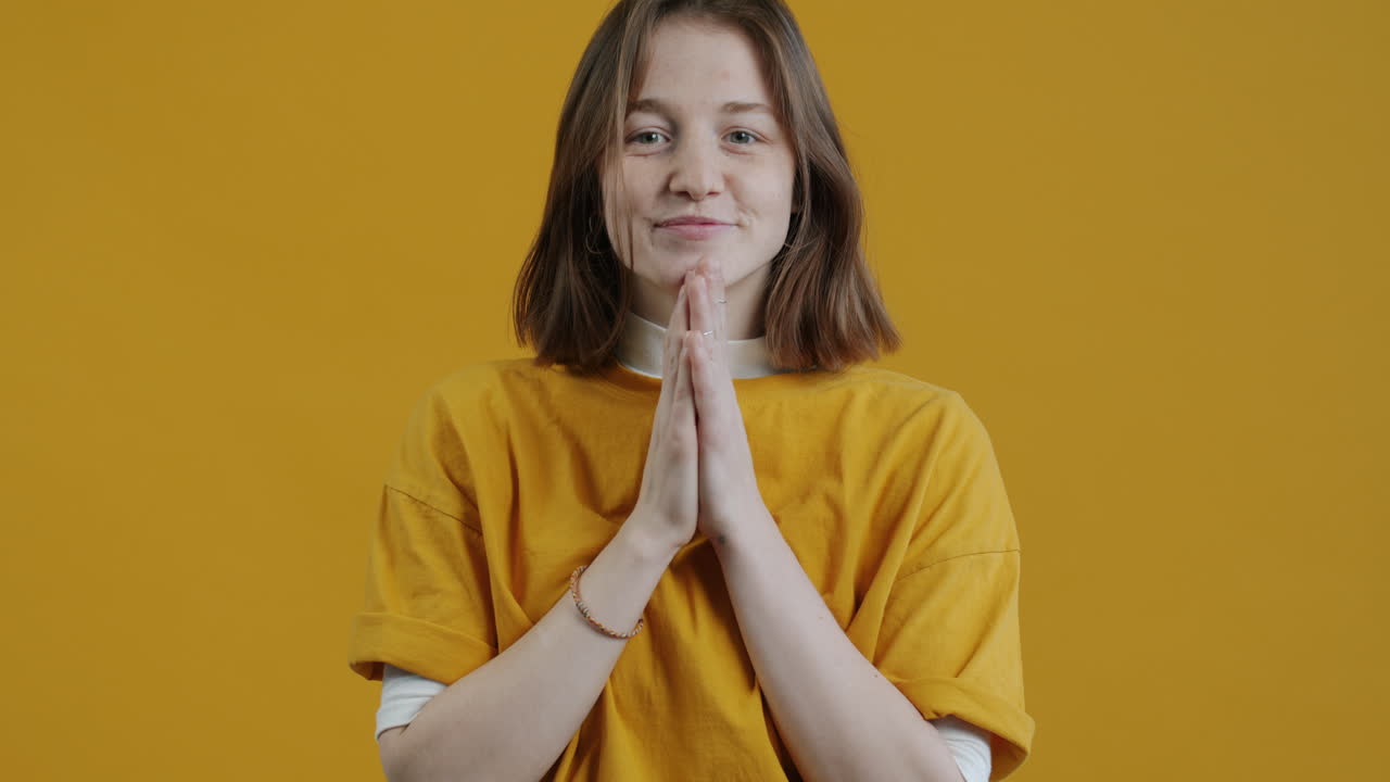 Woman Smiling and Praying