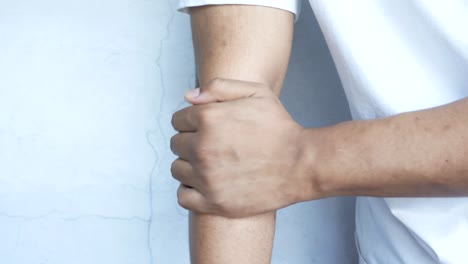 person with elbow pain