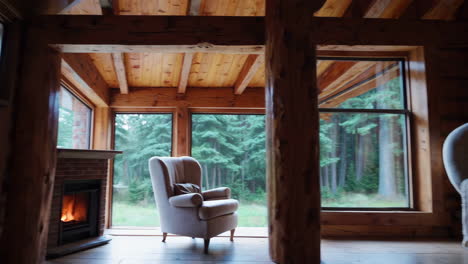 cozy cabin interior with stone fireplace and forest view