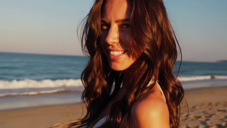 woman at the beach sunset