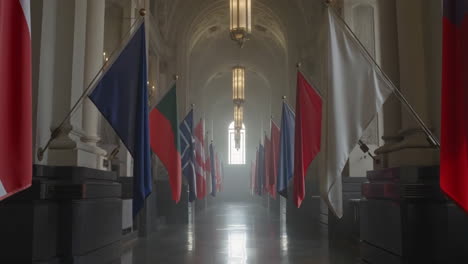 international flags in a grand hallway