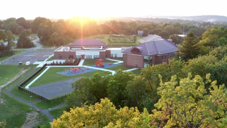 American-school-building-at-sunrise,-sunset