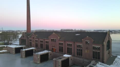 Wouda-Steam-Pumping-Station-in-holland-during-winter-season,-aerial