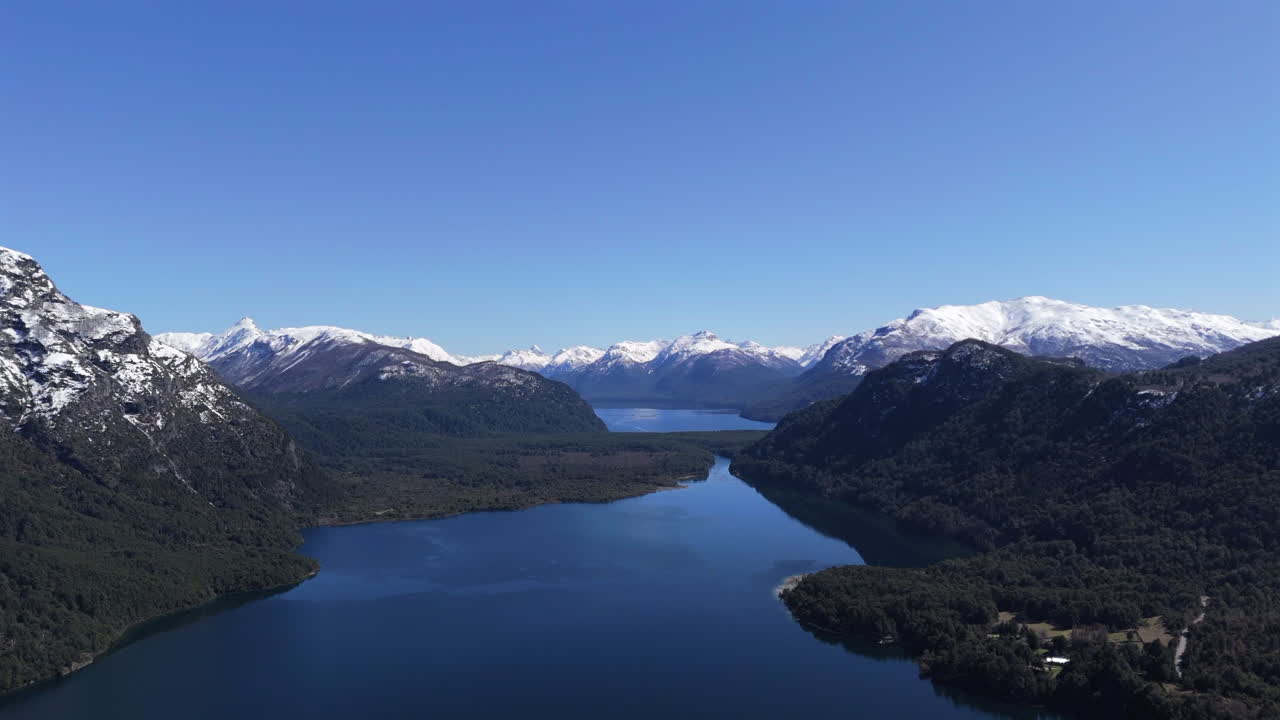Aerial landscape of Patagonian mountainous lake at Alerces National Park, frozen Peaks of Chubut province, Argentina