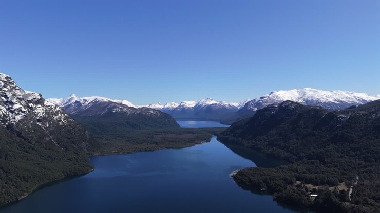 Aerial landscape of Patagonian mountainous lake at Alerces National Park, frozen Peaks of Chubut province, Argentina