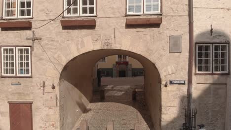 swedish gate in old town riga, latvia, aerial drone flying backwards