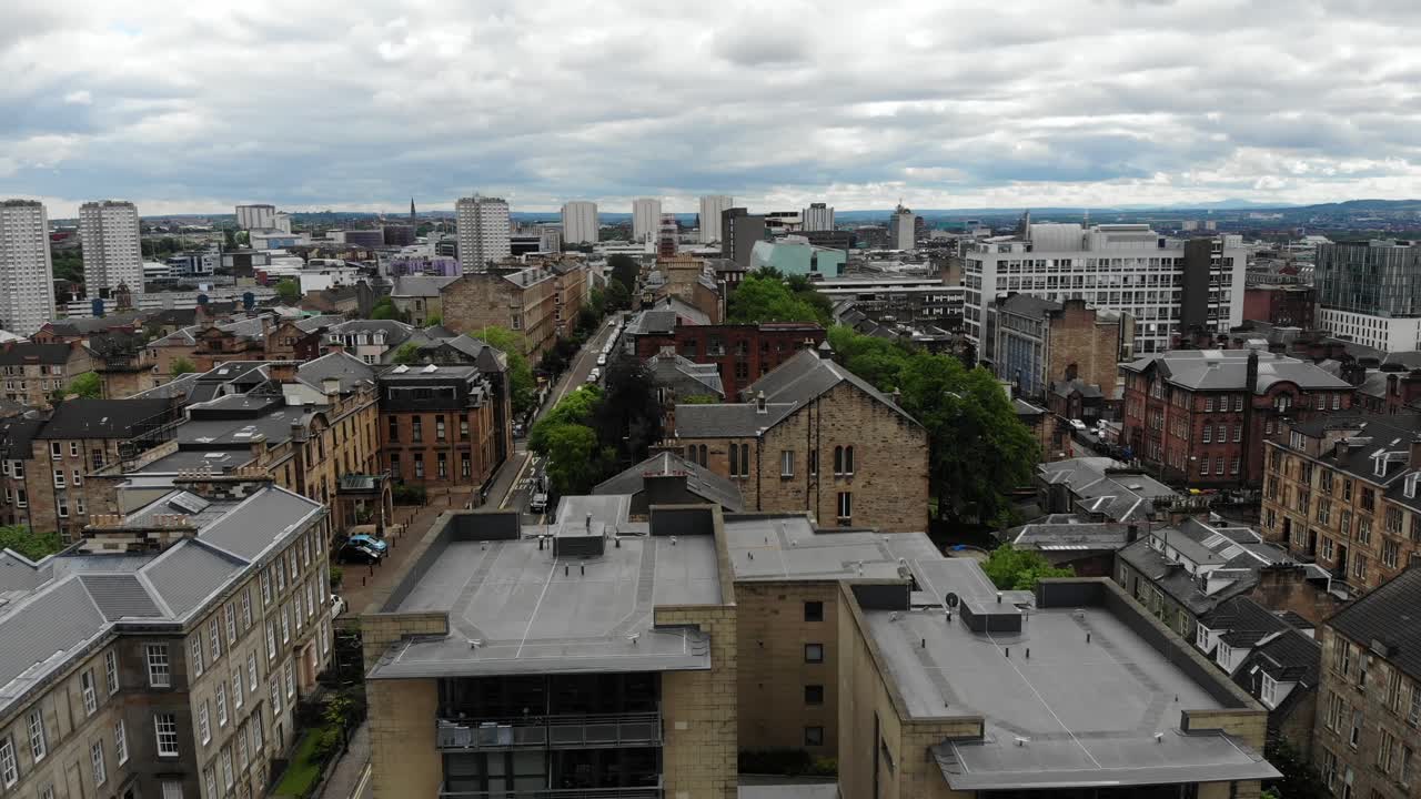Aerial view of Glasgow city center high-end apartment building rooftops in Scotland, UK