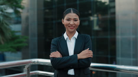 confident businesswoman in a city setting