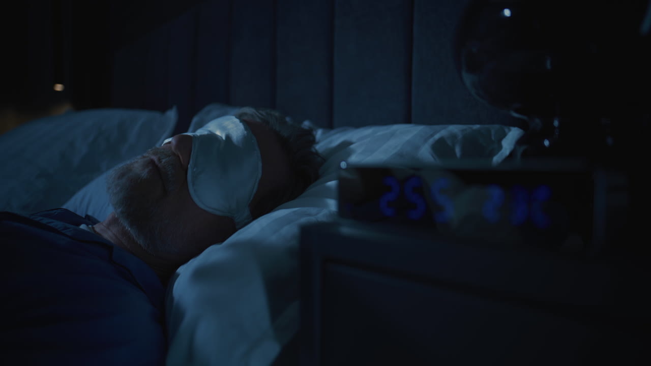 Middle Aged Man Suffering From Insomnia