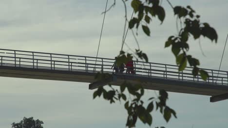 tourists walking on bridge to belle isle in richmond virginia 4k