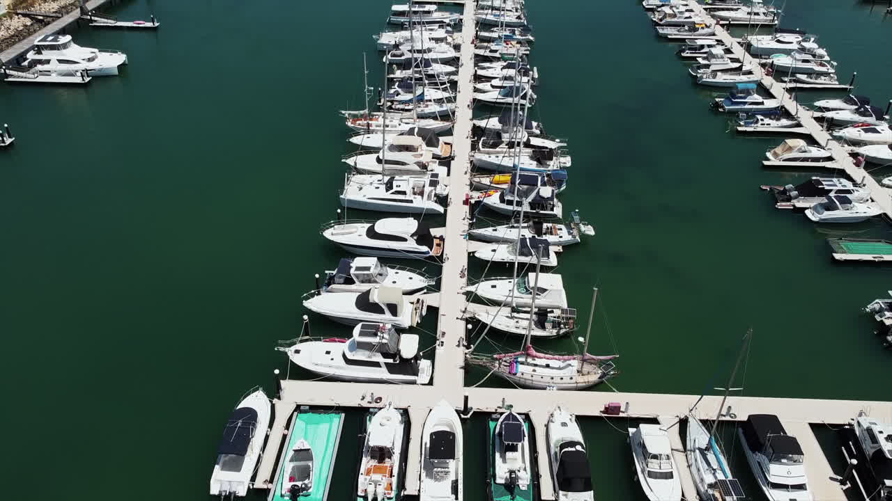Aerial view of the harbor with yachts and sailboats at anchor in marina bay