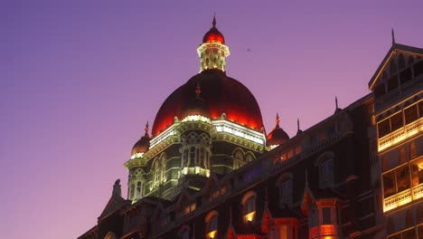 dome of the taj mahal palace hotel old wing building in evening, closeup, mumbai, maharashtra