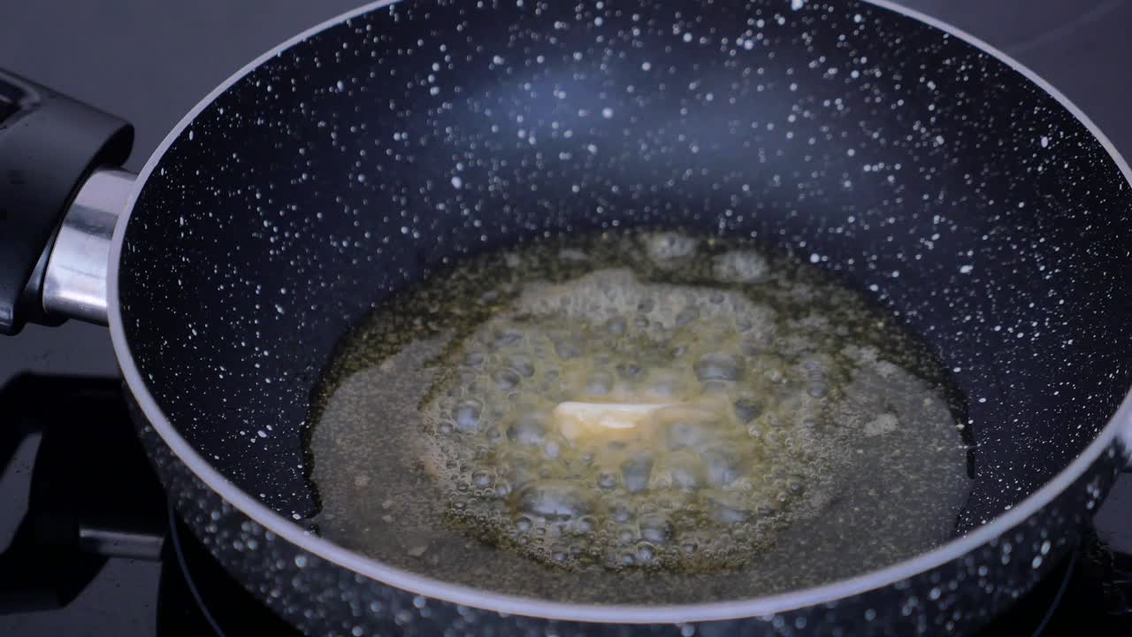 Butter melting in a pan