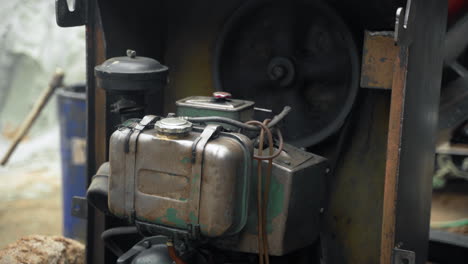 a petrol generator powering a concrete mixer