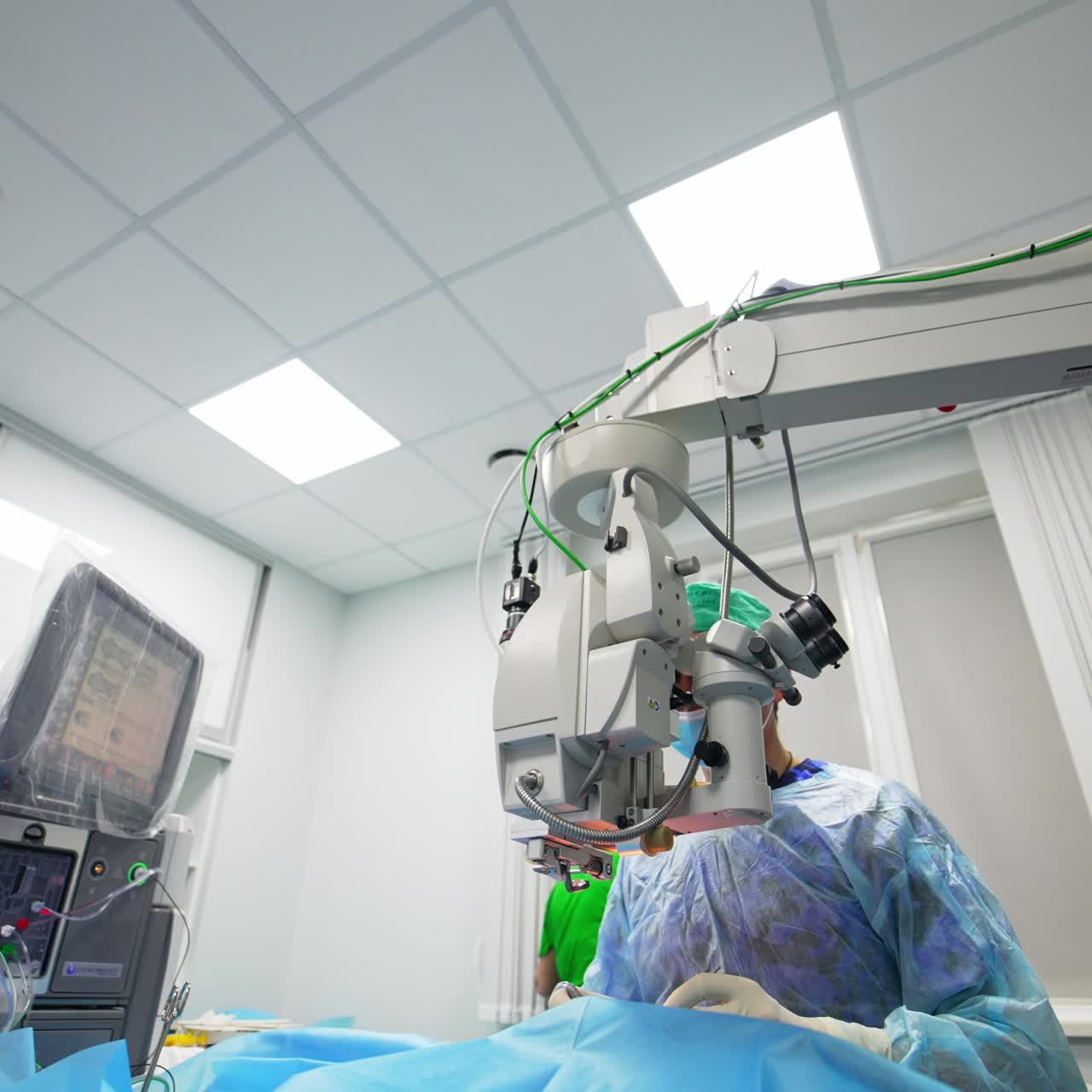 Using advanced technologies at modern operation. Low angle view at up-to-date equipment for eye surgery