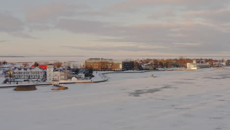 Winter-riviera-aerial-of-a-promenade-in-Haapsalu,-Estonia