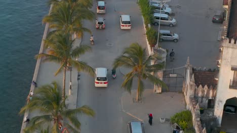 Fly-Over-Zanzibar-Promenade-During-Rush-Hour-Cropped