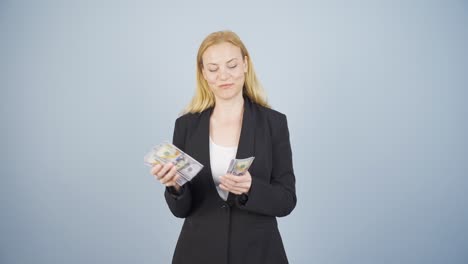 Rich-business-woman-counting-money.