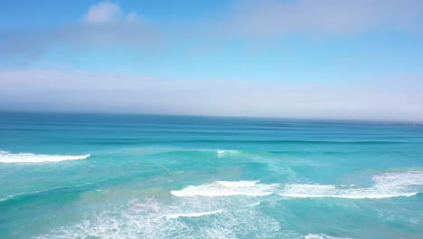 blue ocean water aerial shot over waves south africa