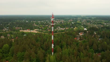 4k aerial footage telecommunication tower with antennae for cell phone, radio transmitters