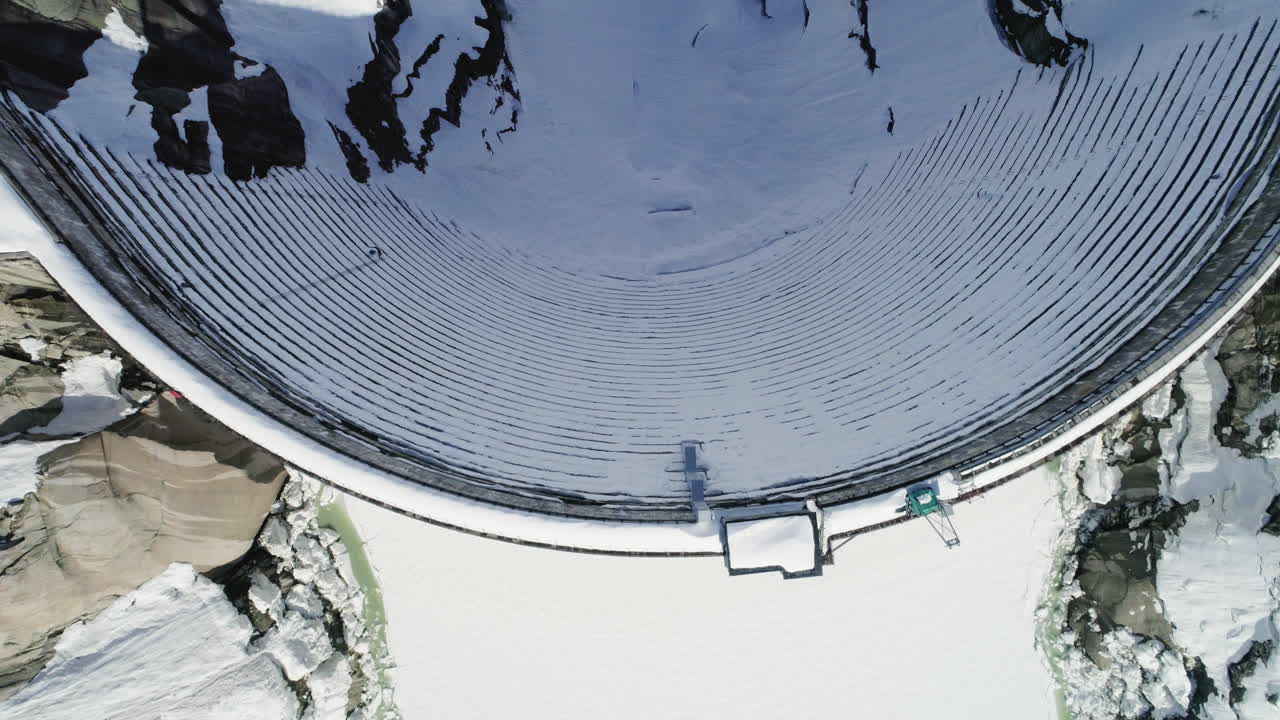 Aerial of a dam in winter
