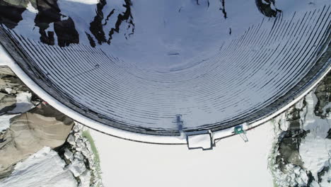 aerial of a dam in winter