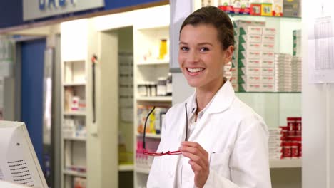 Pharmacist-making-prescription-record-on-computer