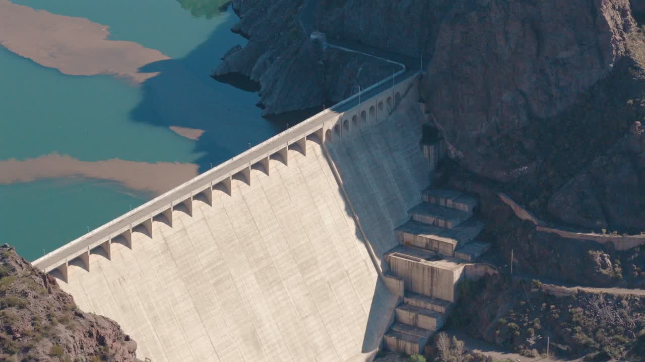 Hydroelectric infrastructure at Valle Grande Reservoir in Mendoza, Argentina, sustainable energy investment