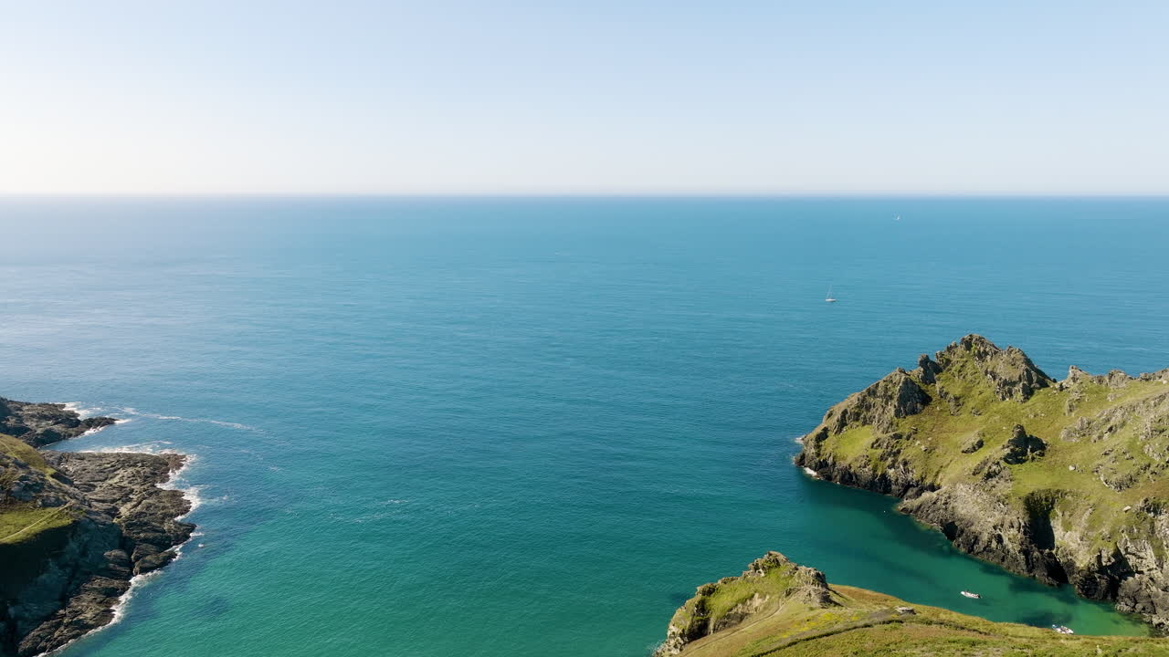 Coastal View of Rugged Cliffs and Bay