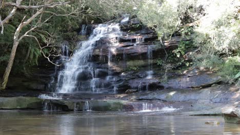 wide shot of somersby falls near sydney australia in the brisbane water national park, locked shot