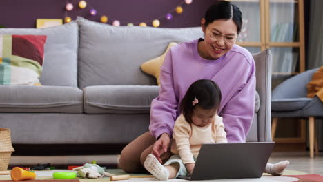 asian mother with her baby