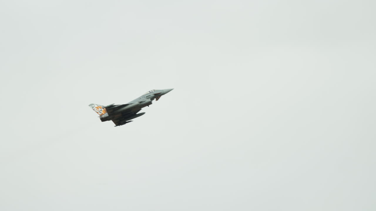 Eurofighter Typhoon Military Jet Flying in Clear Sky