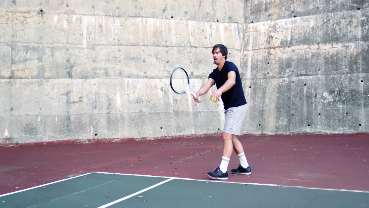 Active man playing tennis