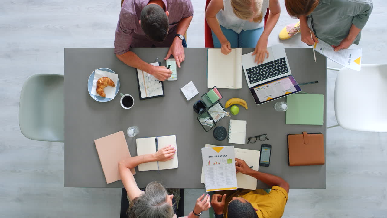 Top view, startup office and team in meeting