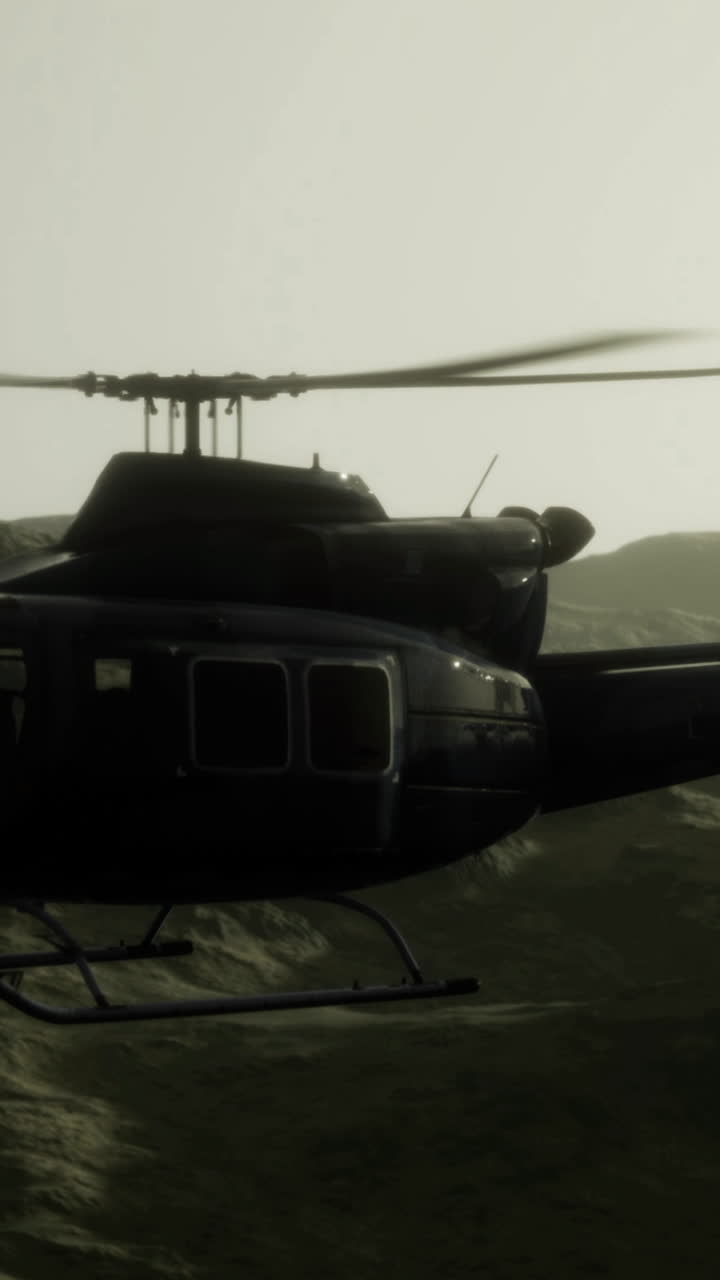Helicopter flying over rugged mountains during twilight hours