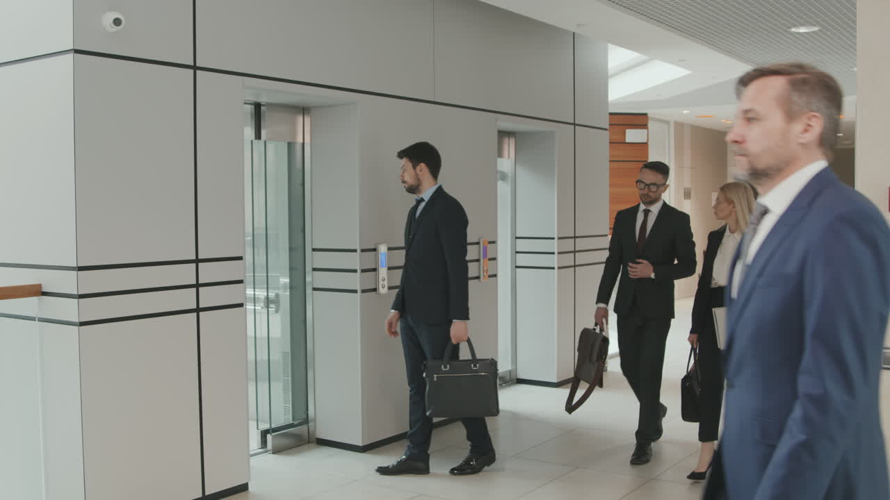 Business People Walking through Office