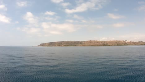 Tabarca-island-off-Alicante-coast-in-Spain,-time-lapse-view-from-the-sea