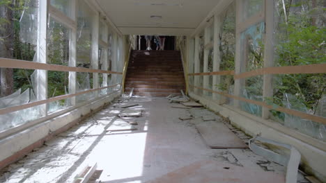 Destroyed-and-abandoned-Corridor-in-an-old-Building-in-Slow-Motion