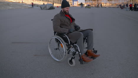 man in wheelchair outdoors