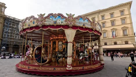 colorful carousel spinning in florence's historic square