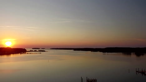 sunset on pungoteague creek flying over harbortown on the eastern shore of virginia