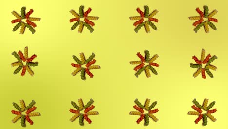eliche pasta italiana animación en stop motion, fondo amarillo mostaza.