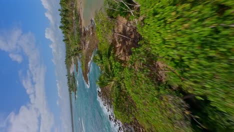 vertical drone flying over playa los coquitos in cabrera, maría trinidad sánchez, dominican republic