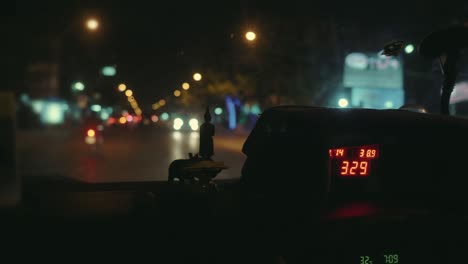 taxi meter display in taxi cab