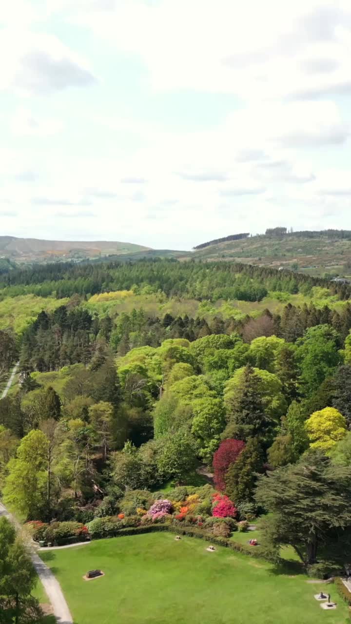 Expansive advancing social ratio vertical video of the Mourne Mountains and Tollymore Forest in Newcastle, County Down in Northern Ireland. Produced in 1080x1920, 60fps and with Rec709 color